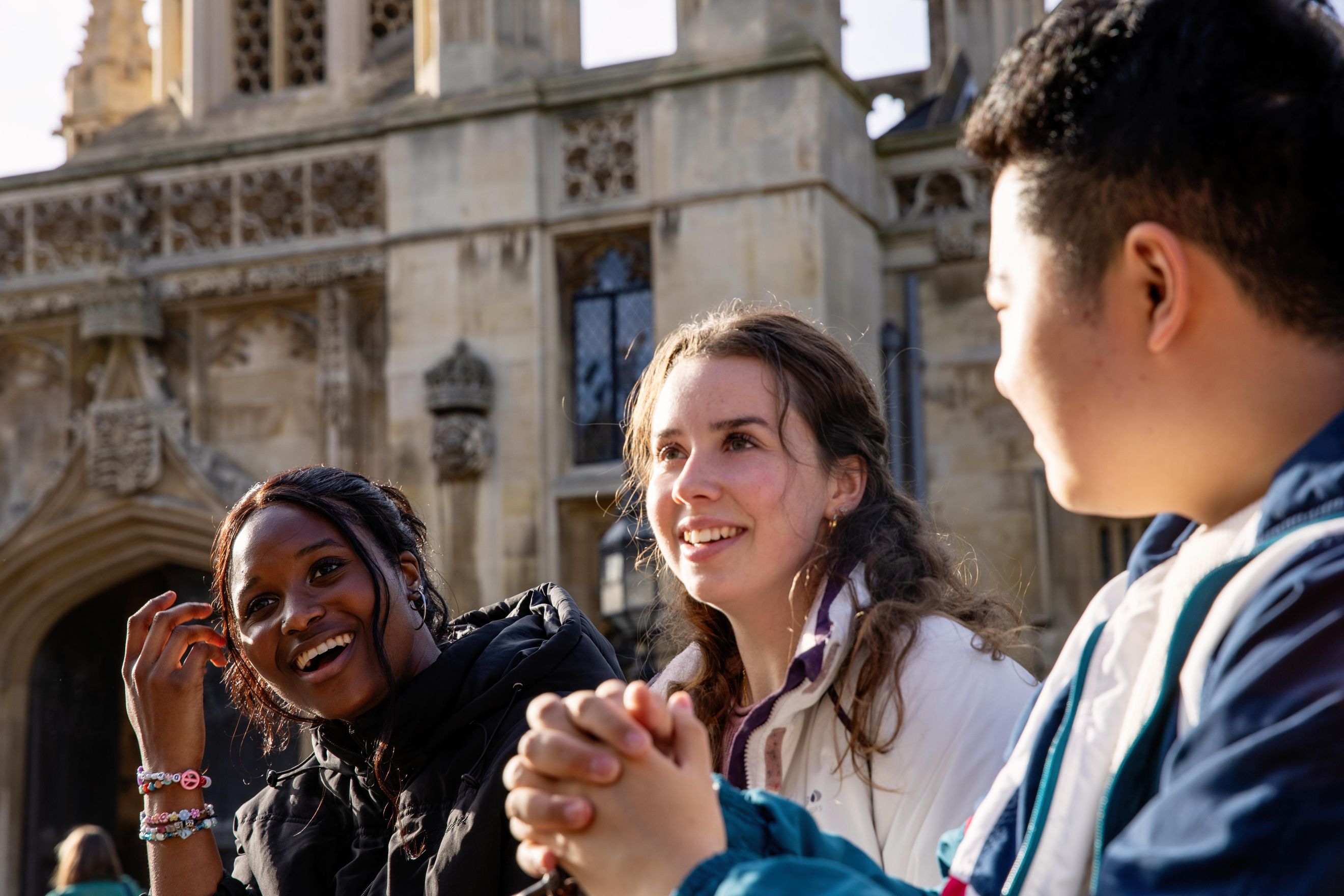 students in front of the a building