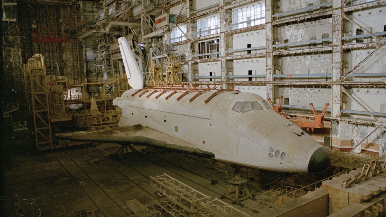 A spaceship in a hangar. 