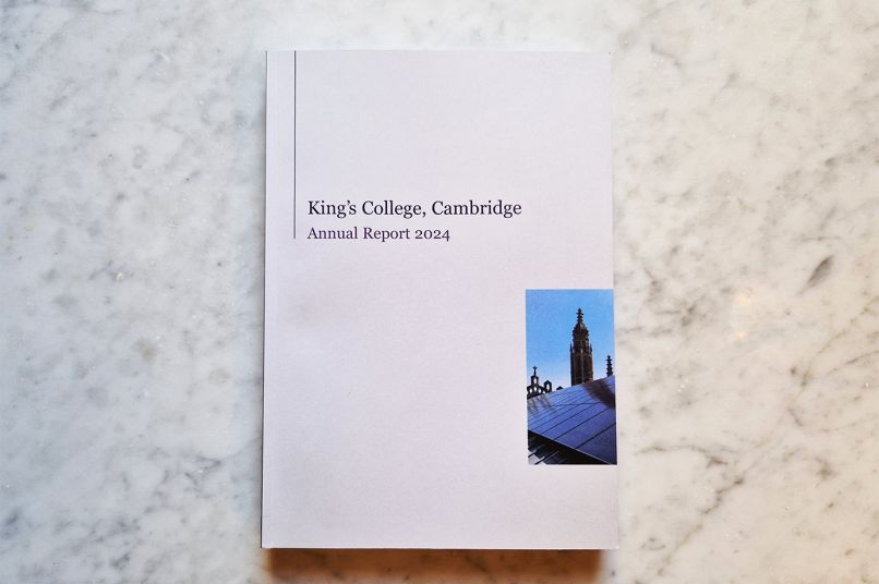 A copy of the Annual Report on a marble table top