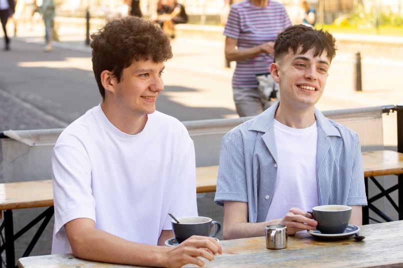 Two students drinking coffee