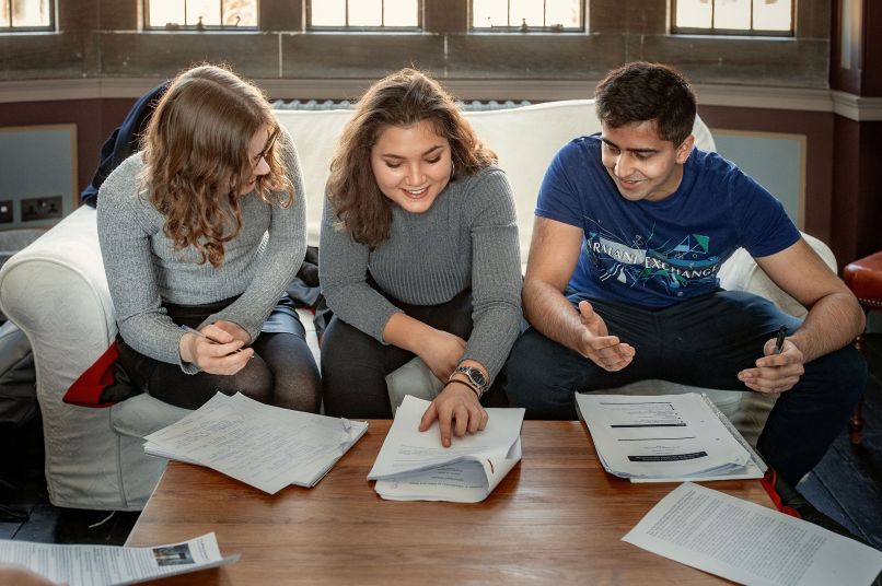 Three students working together