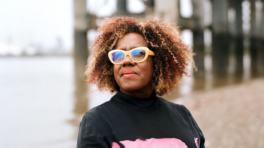 Woman with glasses photographed at the seaside