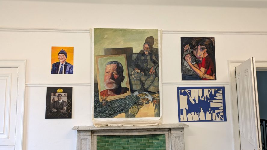 Various paintings above the mantelpiece in the Art Rooms