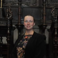 Woman standing by the Choral stalls