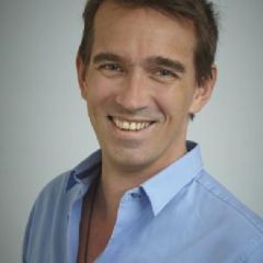 A man in a blue shirt
