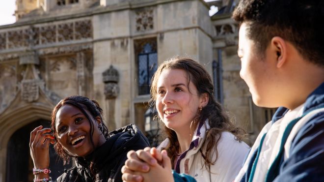 students in front of the a building