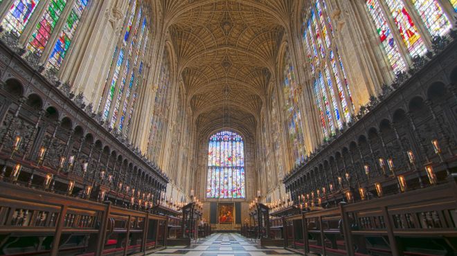 Choir stalls, stained glass windows and fan vaulted ceiling