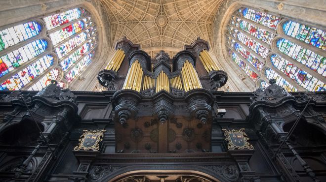 King's College Chapel Organ with stained glass windows and ceiling above