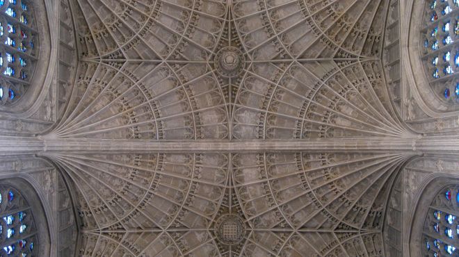 fan vaulted ceiling with stained glass windows on the left and right