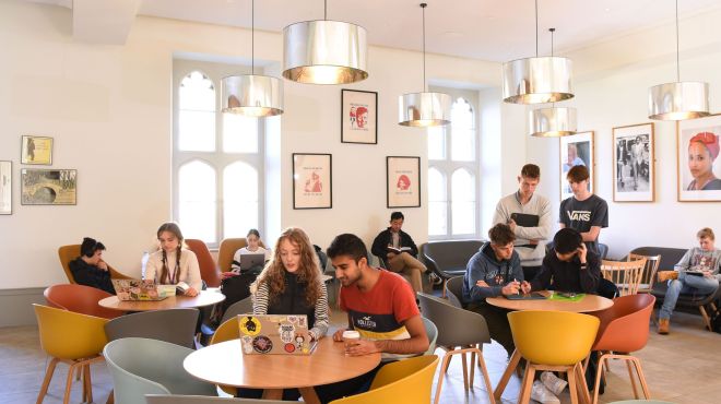students working together in a shared workspace