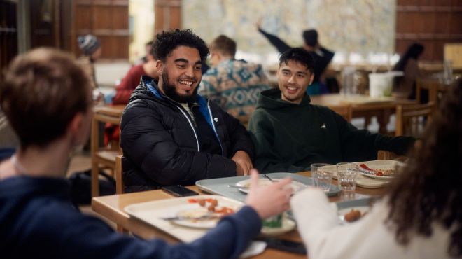 students at lunch in the hall