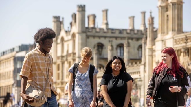 a group of students walking outside King's College