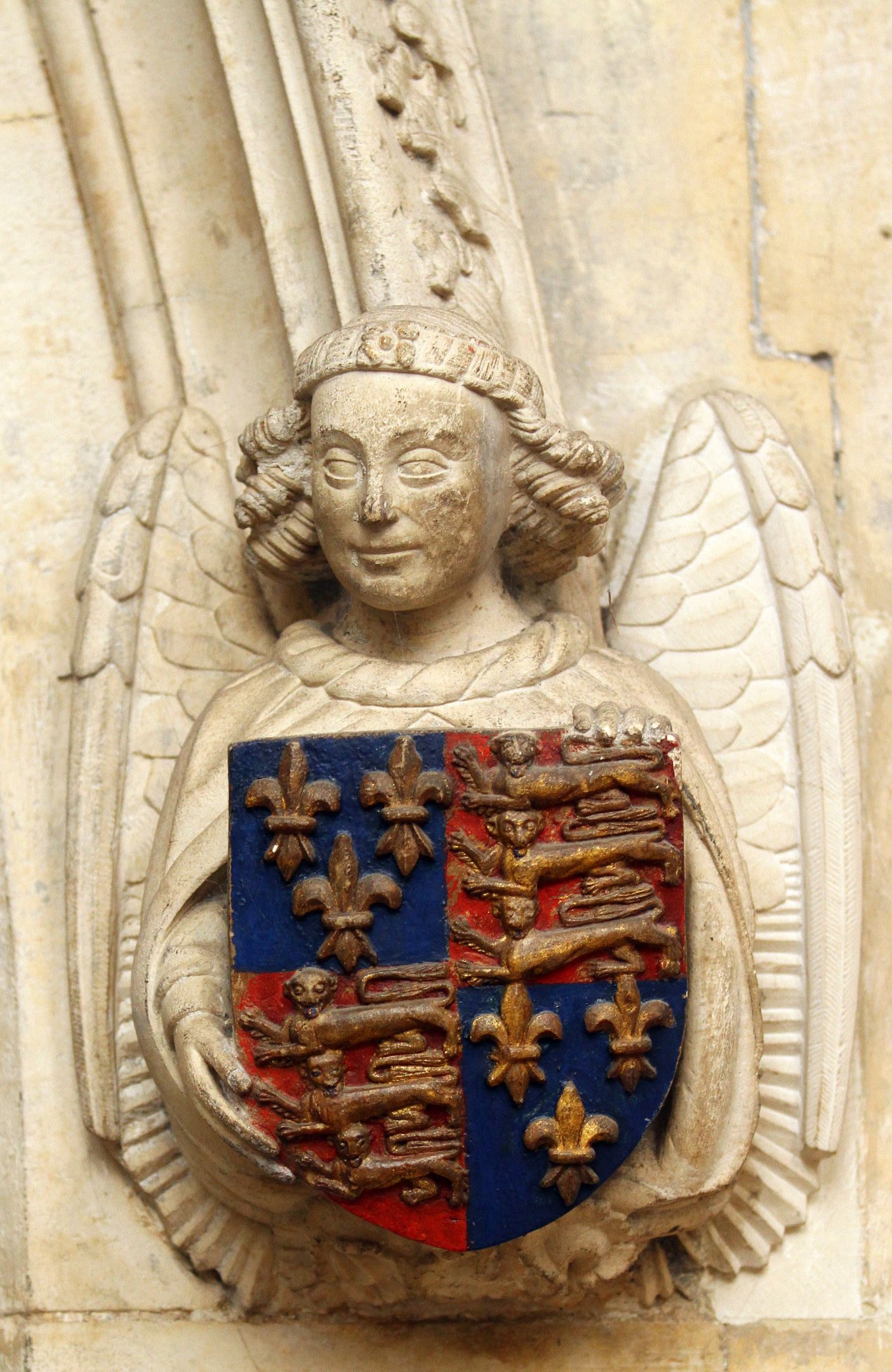 Royal arms borne by an angel by the north Choir doorway. Photograph © Mike Dixon 2011 King’s College, Cambridge [CMR/250, IMG_5497]