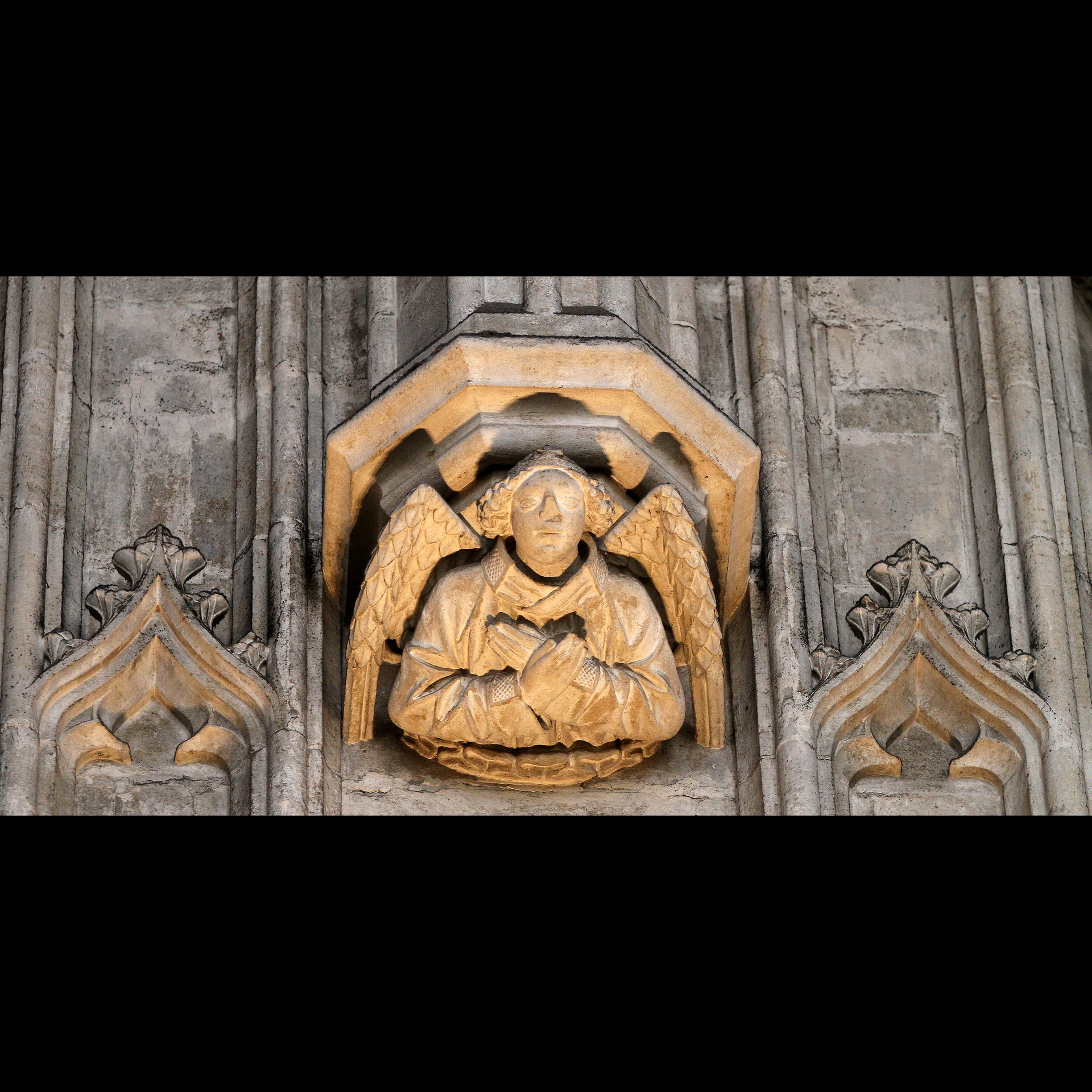 Western corbel angel on north side of the choir, carved during the second period. Photograph: Mike Dixon © 2011 King’s College, Cambridge [CMR/250, IMG_5534]