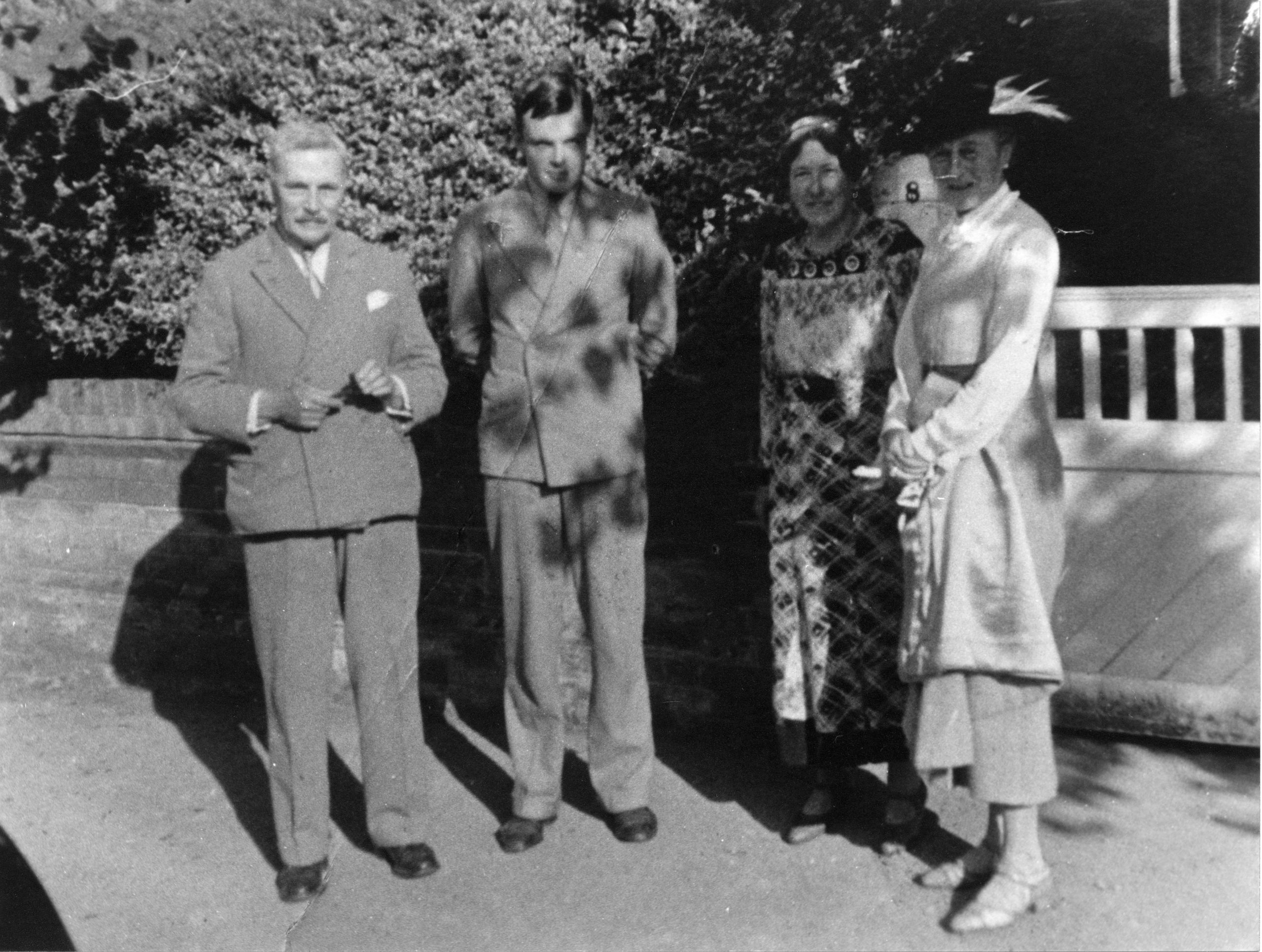 Turing with his parents and an unknown friend of the family standing outside his parents’ house. [AMT/K/7/34]