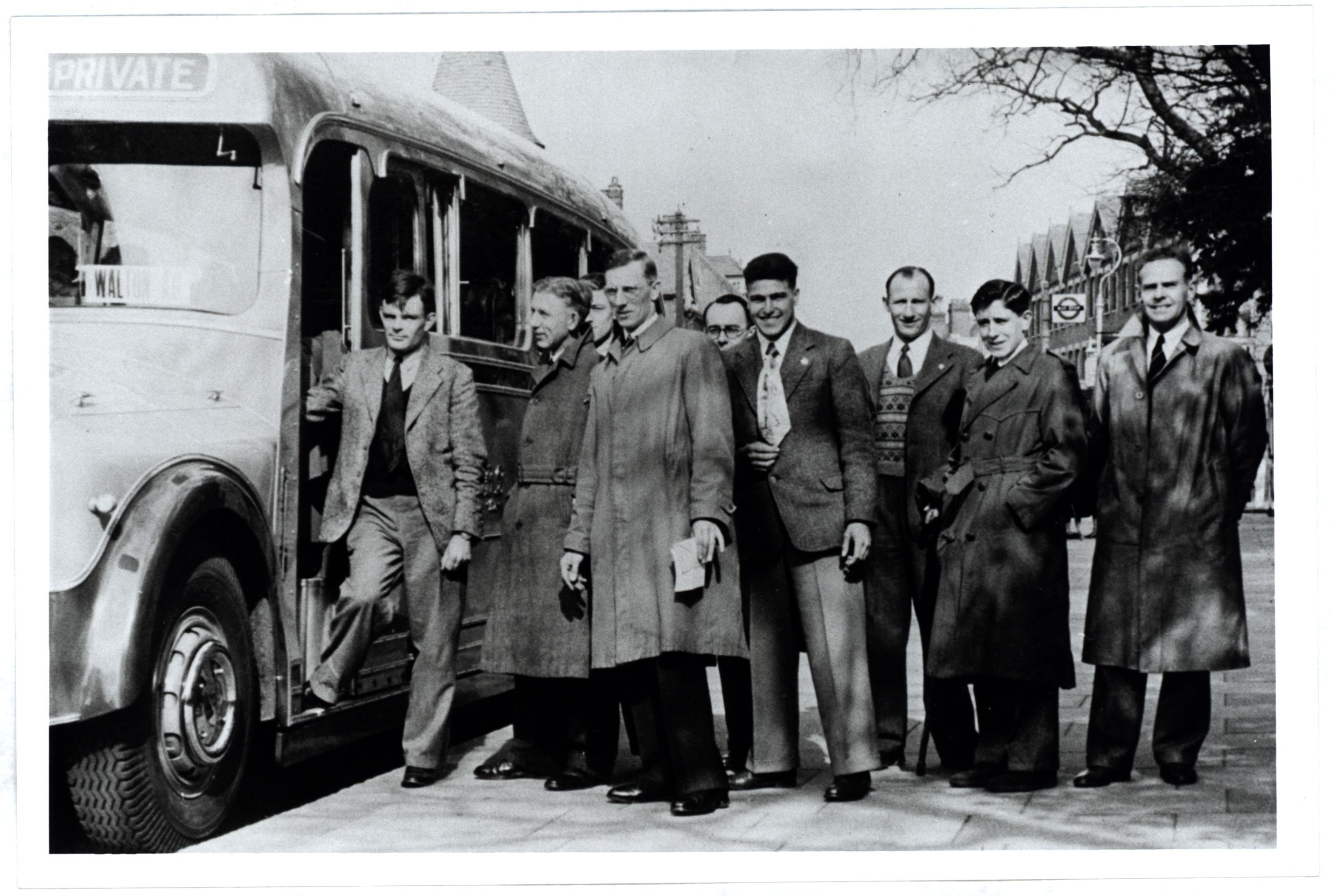 Turing with other members of the Walton Athletic Club, an amateur club based in Walton, Surrey. They were probably on their way to a meeting on a Saturday in 1946. [AMT K/7/19]