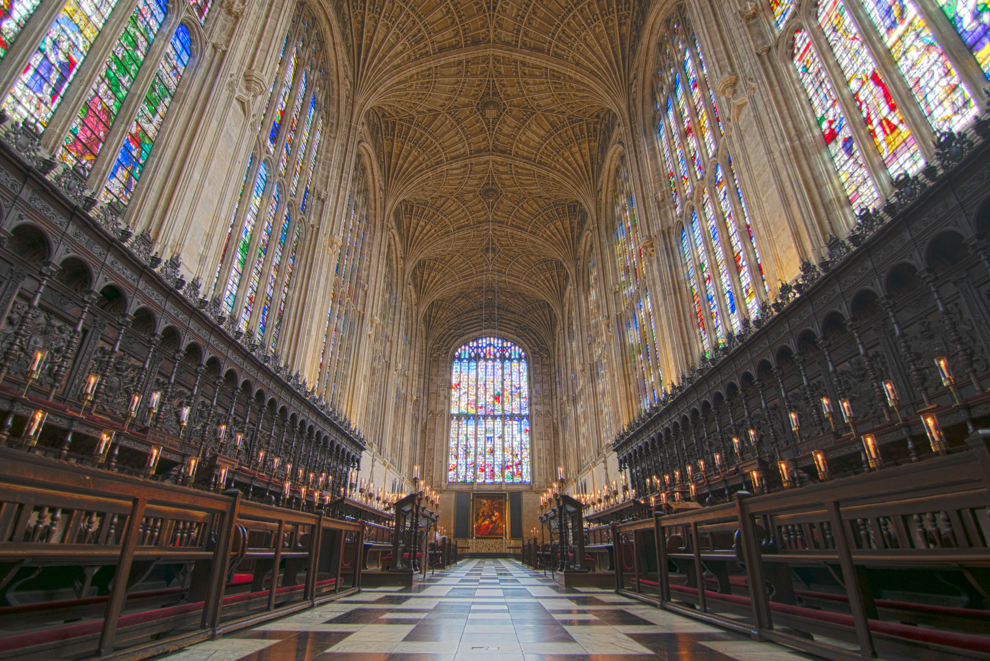 Choir stalls, stained glass windows and fan vaulted ceiling