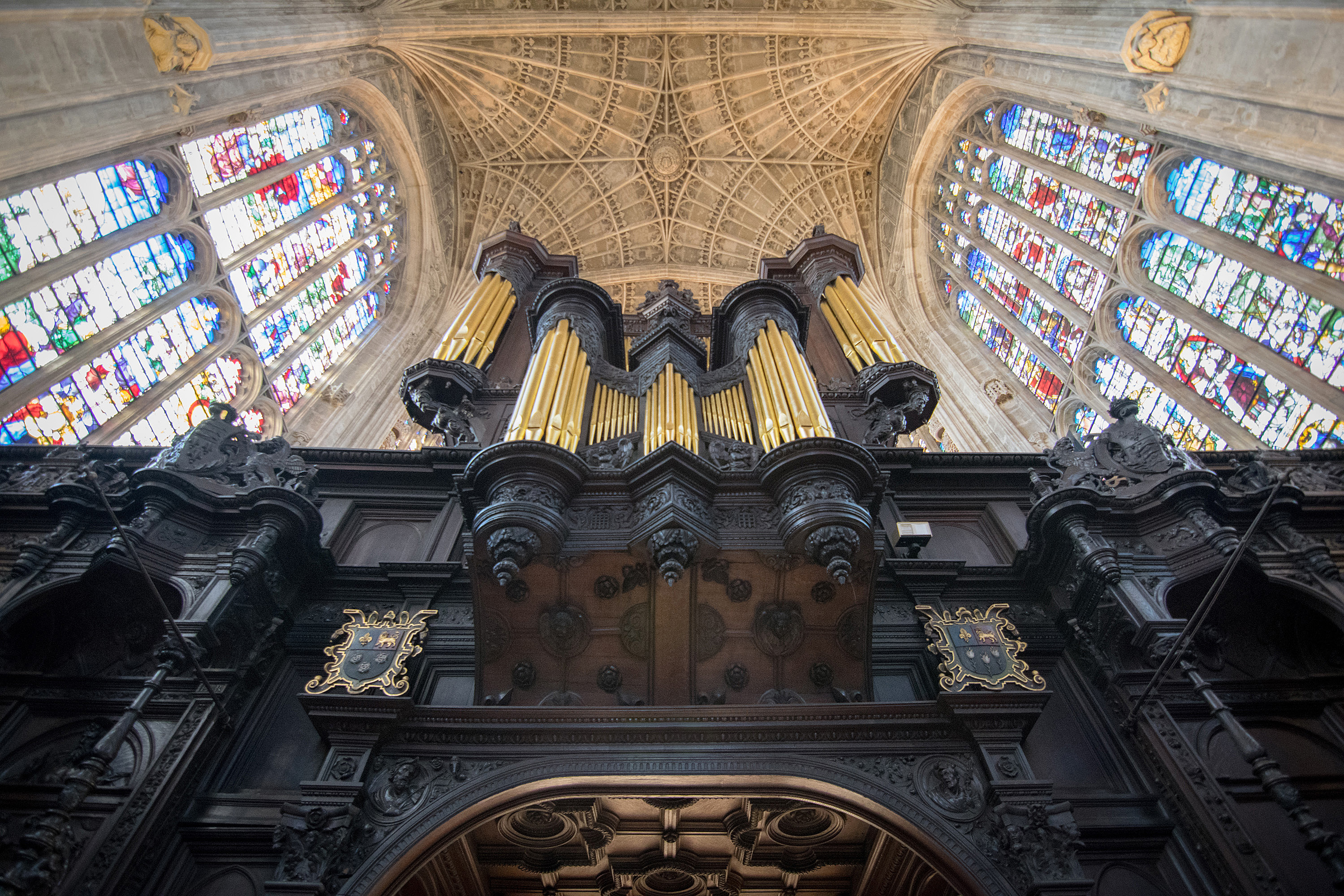King's College Chapel Organ with stained glass windows and ceiling above