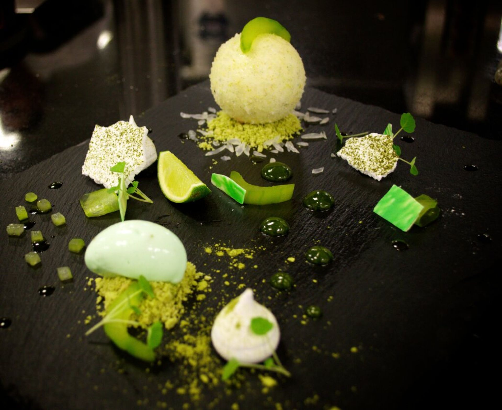 a deconstructed mojito dessert on a slate serving board