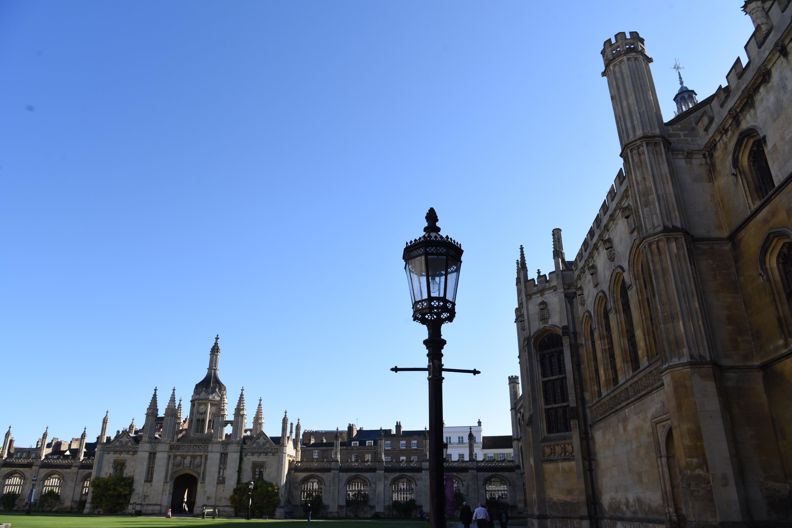 decorative image of buildings and lamppost