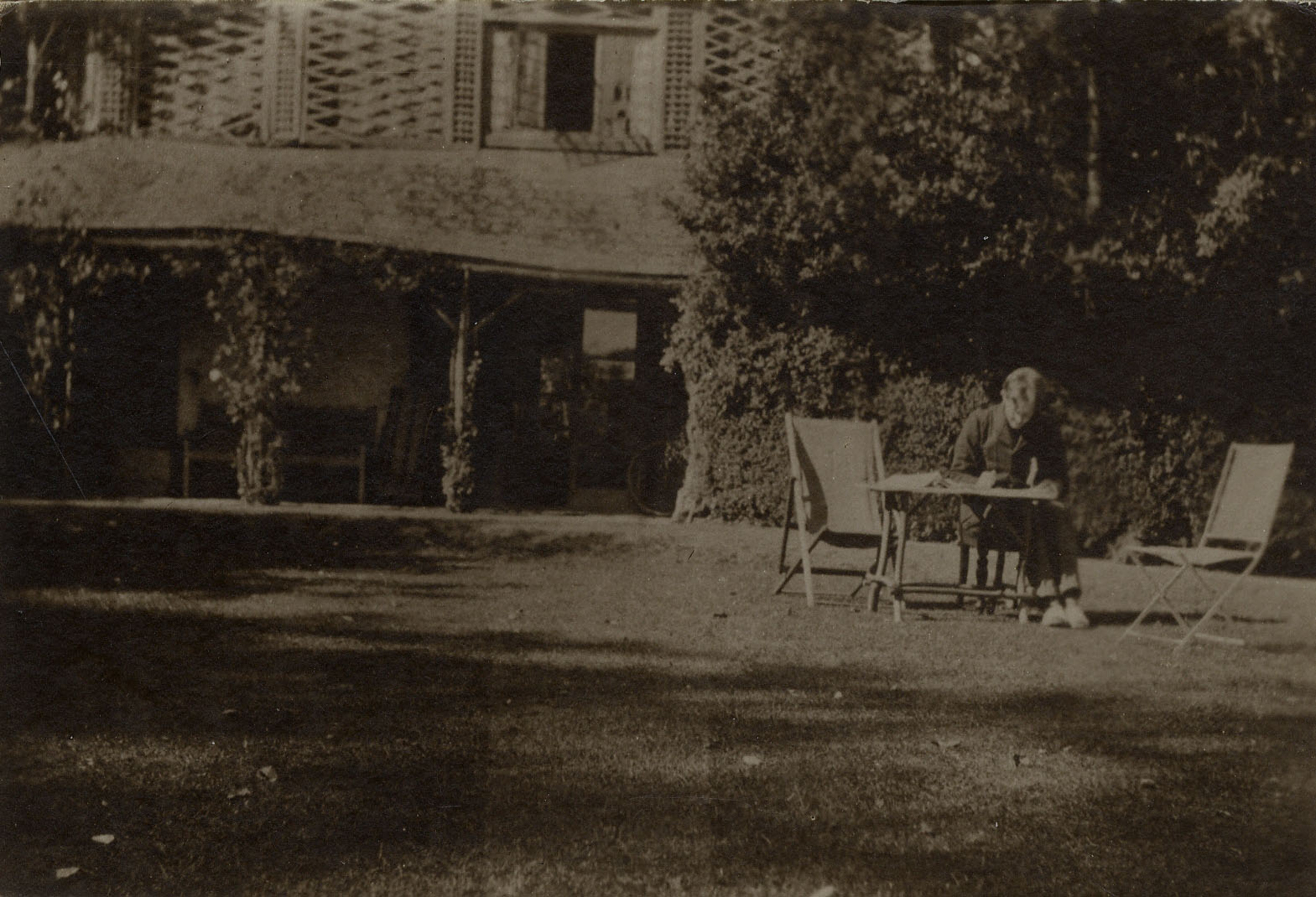 old photo of rupert brooke in garden