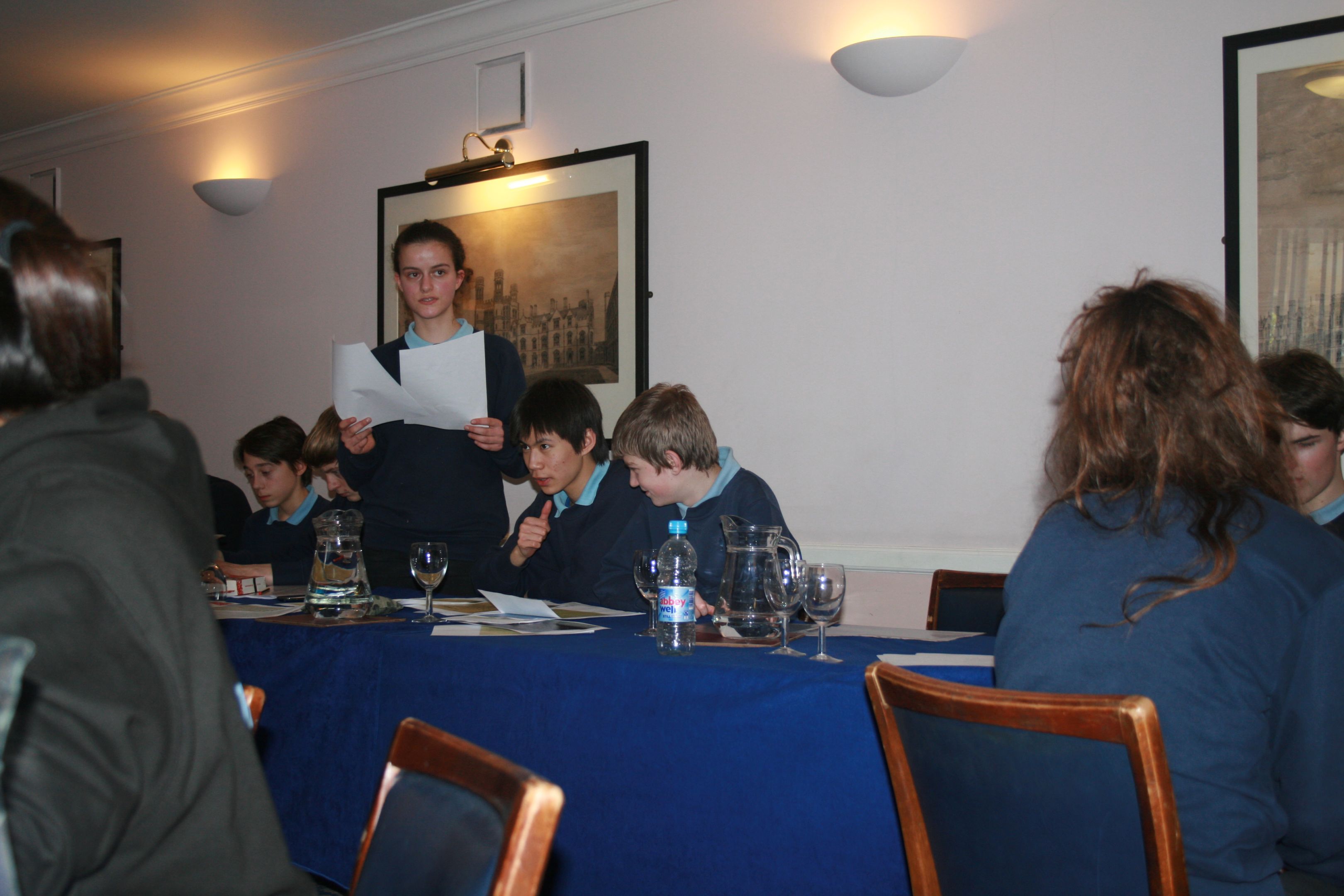 students discussing archival content