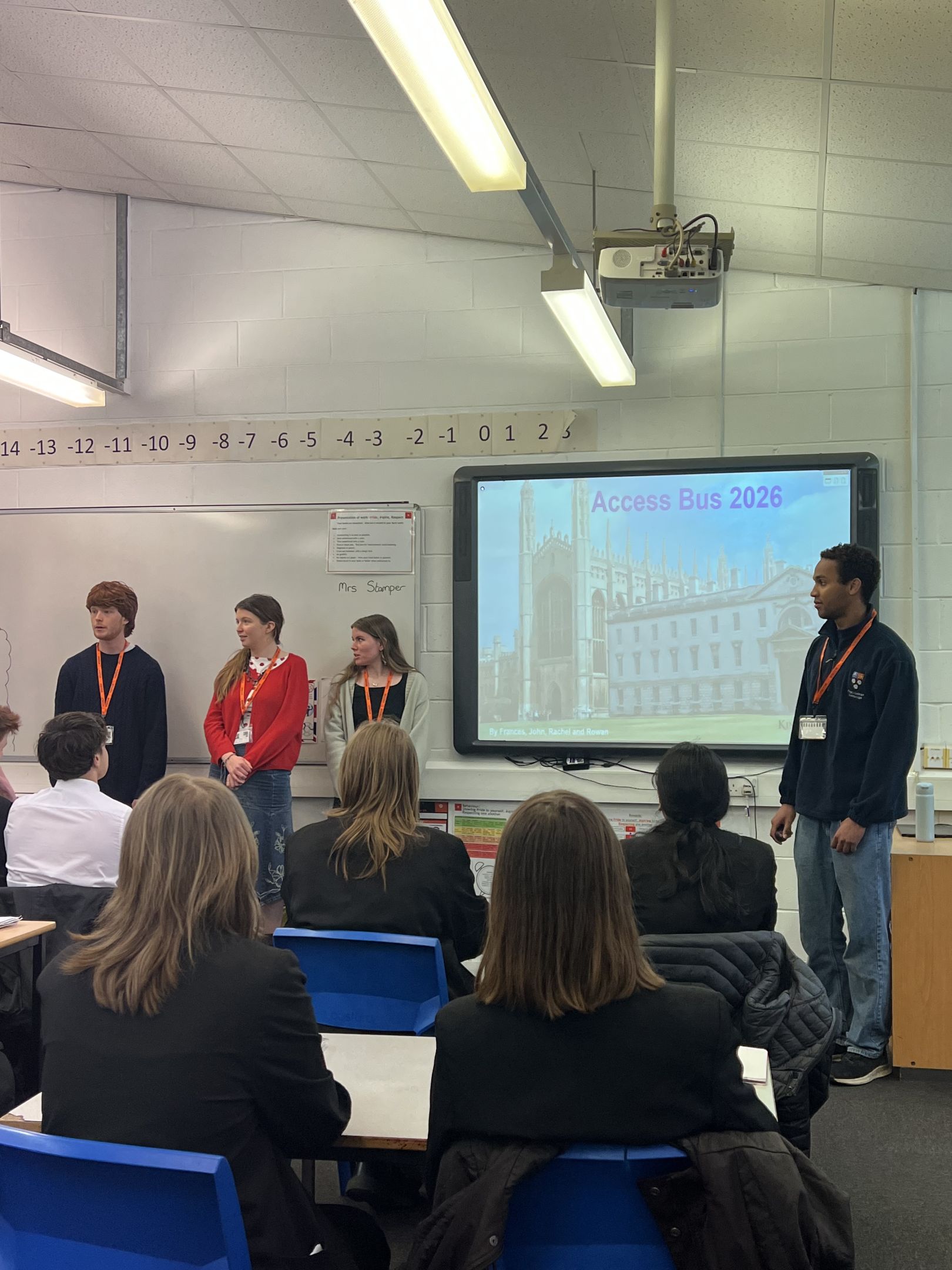 King's students presenting to school students on the Access Bus